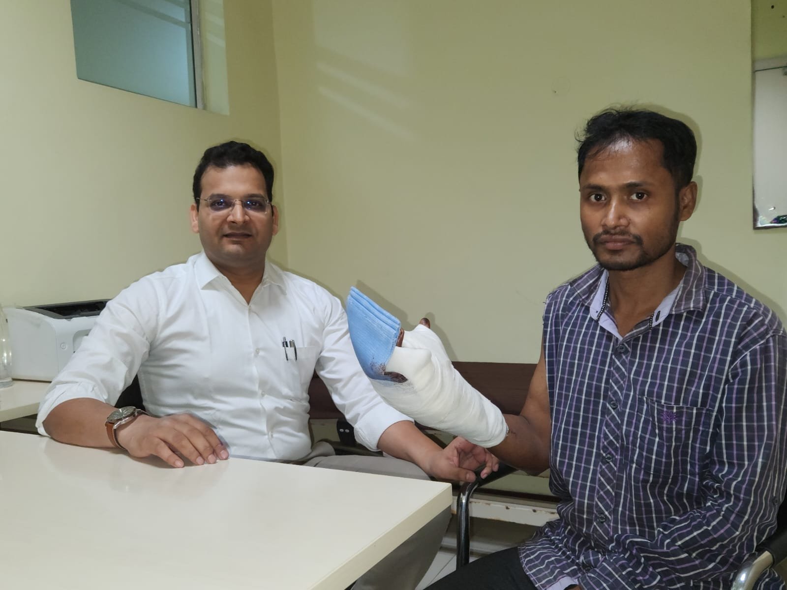 Dr. Akhilesh K. Agarwal, Senior Consultant Plastic & Reconstructive Surgeon, Department of Plastic Surgery, Medica Superspecialty Hospital with Patient post surgery